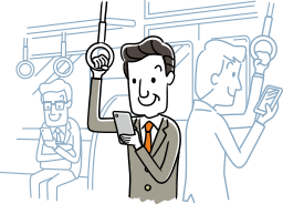 つり革を持ち携帯を見る男性