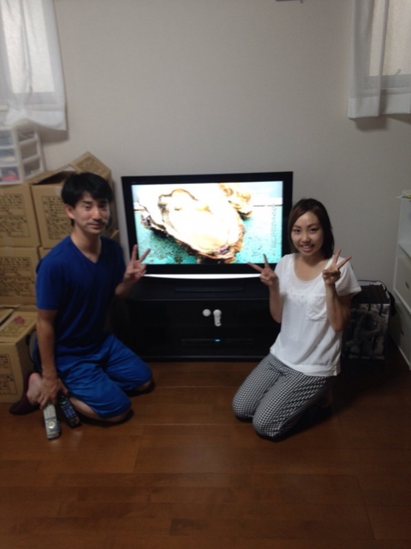 ピースサインの夫婦